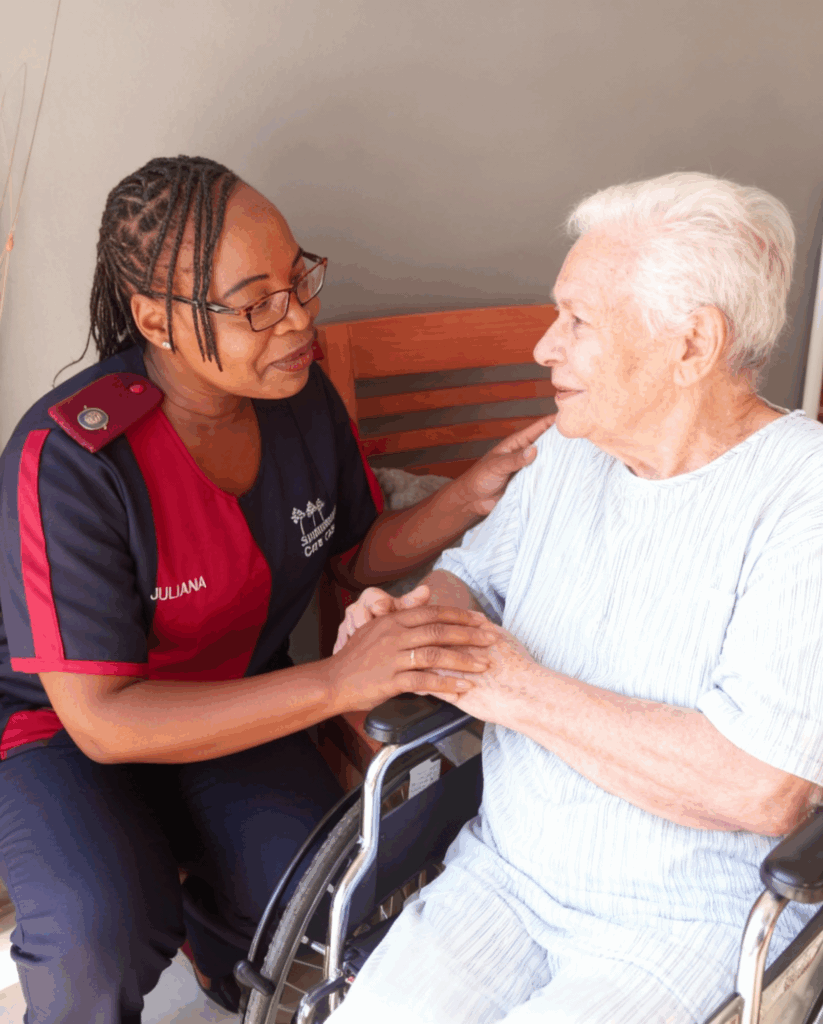 Sr Juliana from Summervale Care Centre offering compassionate support to an elderly resident, showing that Pain Management for the Elderly is often about empathy and comfort, not just medication.